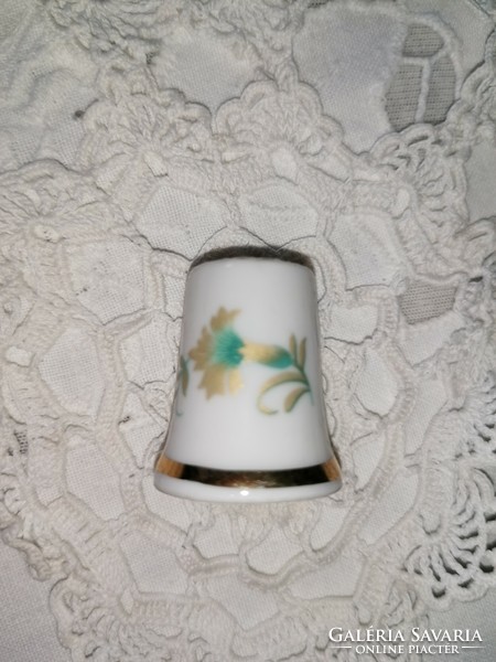 Porcelain thimble with Raven House markings 11.