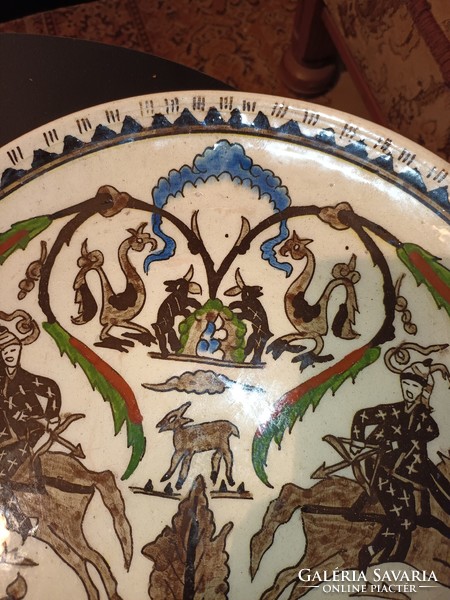 Earthenware. A mythological figure, a large decorative wall plate!