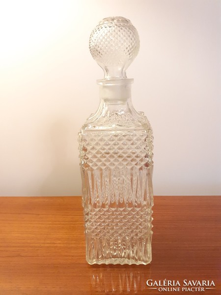 Old whiskey drink bottle with art deco nature in cork bottle