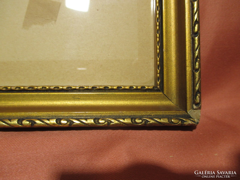 2 old picture frames with glass