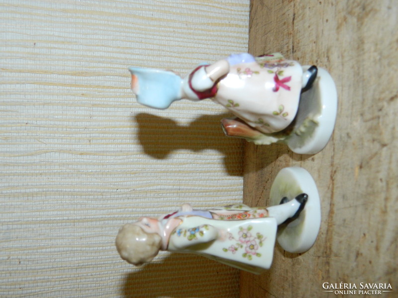 Pair of children in antique Hummel and Goebel baroque clothes