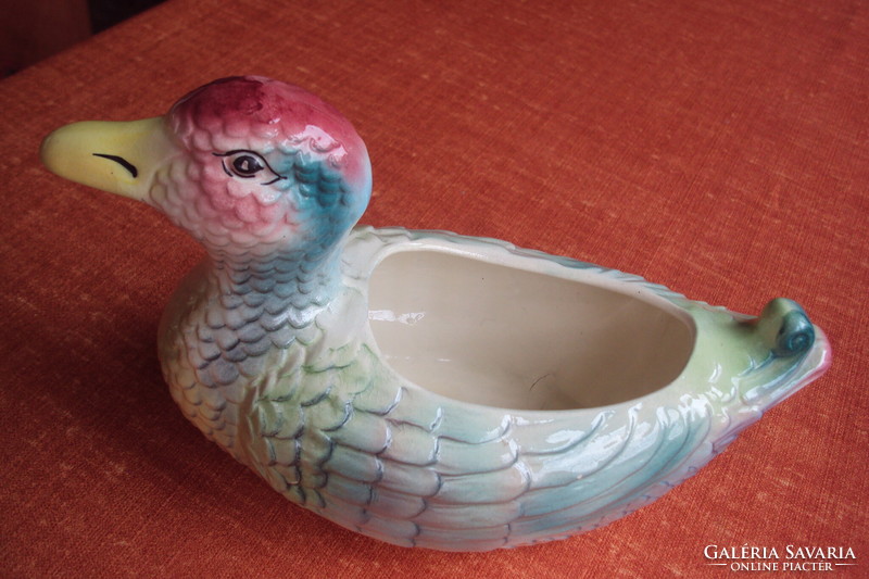 Colorfully painted porcelain serving bowl imitating the shape of a duck.