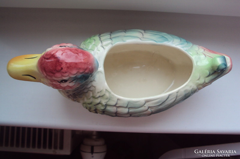 Colorfully painted porcelain serving bowl imitating the shape of a duck.