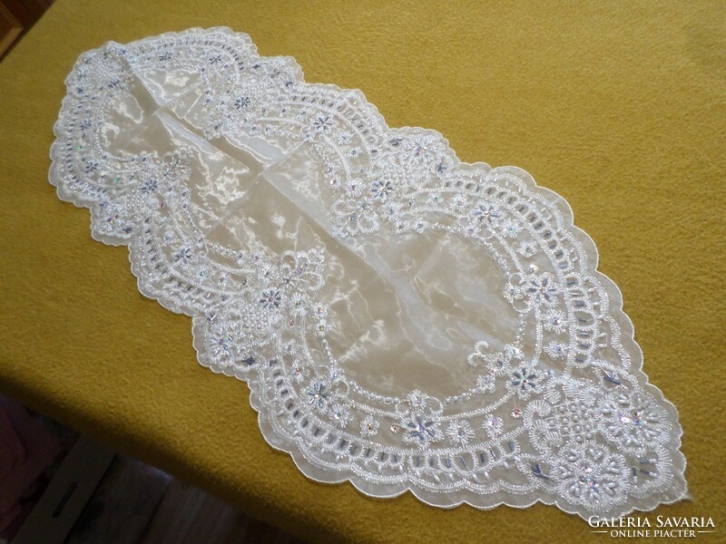 Special hand-embroidered beaded tablecloth.