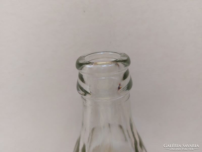 Retro glass bottle of extra carbonated soft drink with inscription