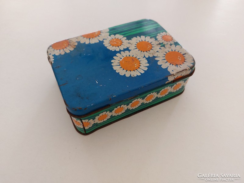 Old metal box with flower box