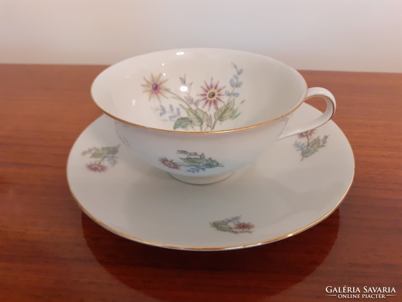 Old Bavarian porcelain coffee cup with vintage flower pattern