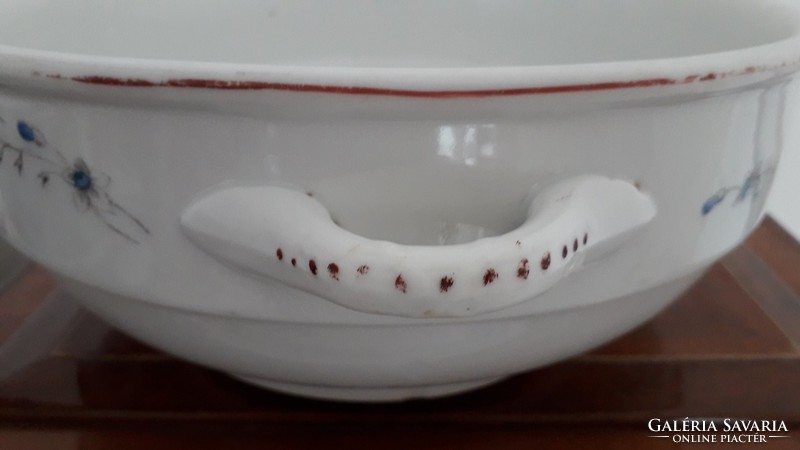 Old porcelain bowl with floral folk comma