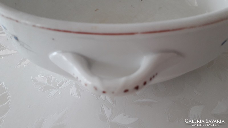 Old porcelain bowl with floral folk comma