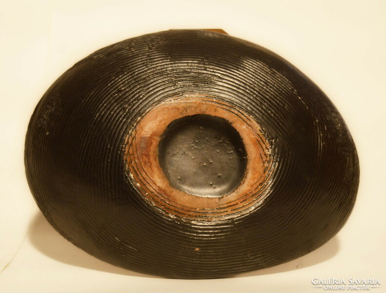 Glazed ceramic bowl.