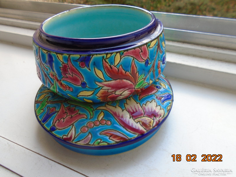 Antique longwy majolica bonbonier embossed with colorful enamel patterns on a turquoise background