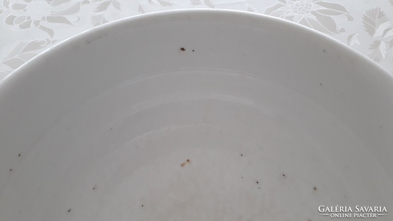 Old porcelain bowl with floral folk comma