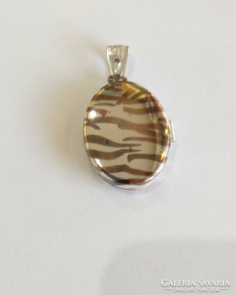 New, silver openable photo holder pendant with a zebra pattern. 6.31G. (E. 11.)