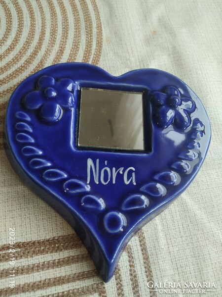Ceramic heart-shaped, mirrored board for sale! With the inscription Nora