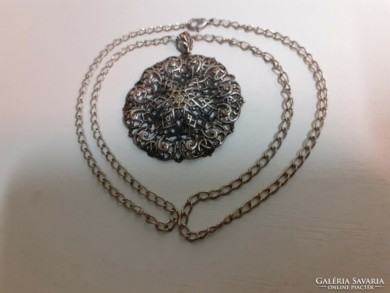 Retro industrial art necklace with an openwork pattern pendant