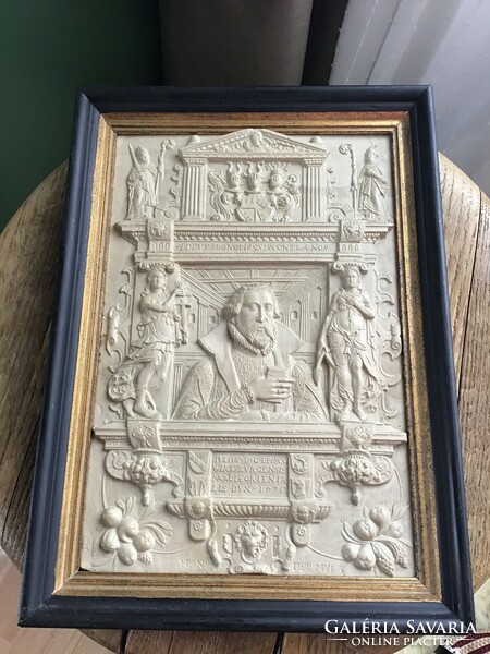 A framed picture made of older special cast material, with the stamp of the wagnermuseum