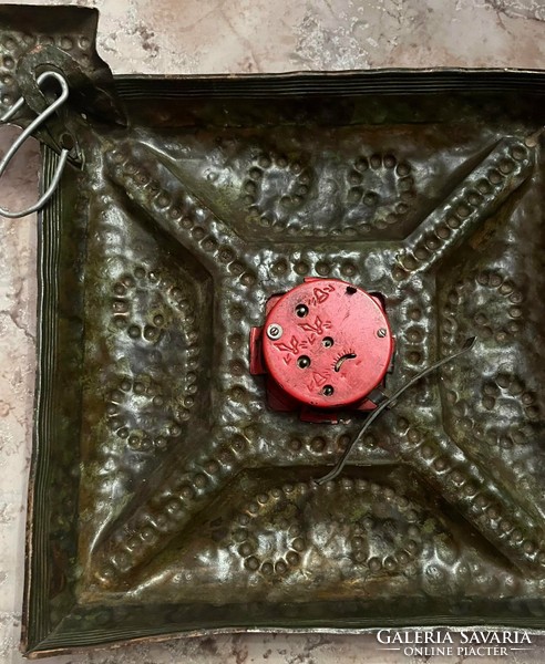 Retro wall clock covered with copper plate