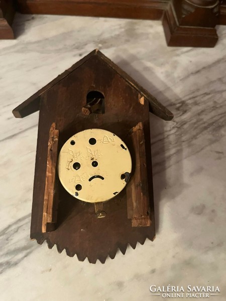 Carved and painted cuckoo clock
