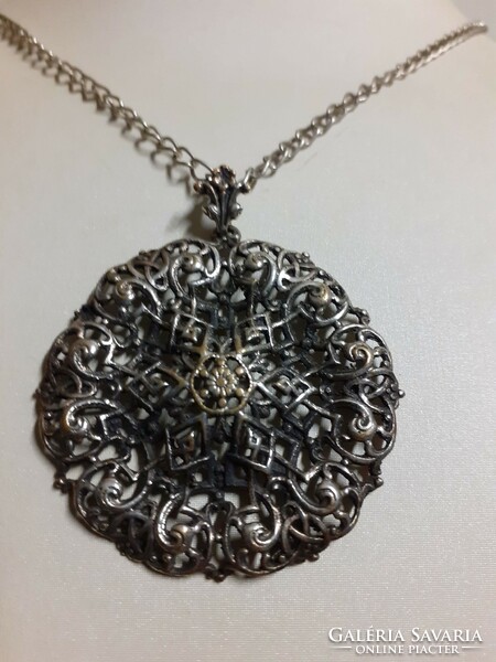 Retro industrial art necklace with an openwork pattern pendant