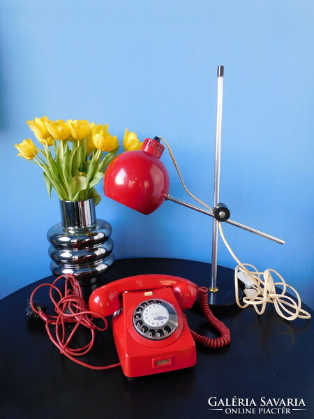 Retro red phone and desk lamp