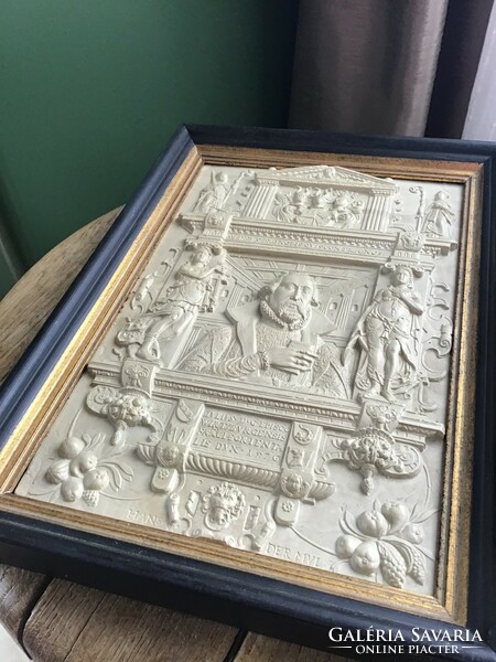 A framed picture made of older special cast material, with the stamp of the wagnermuseum