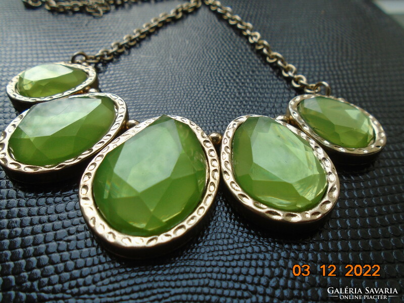 Necklace made of 5 large flat-faced interlocking lime green glass pendants in a silver-plated socket, with a chain