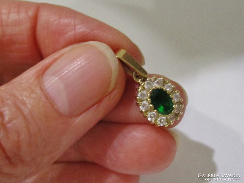 Beautiful 14kt gold pendant with emerald green and white stones