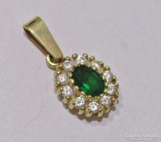 Beautiful 14kt gold pendant with emerald green and white stones