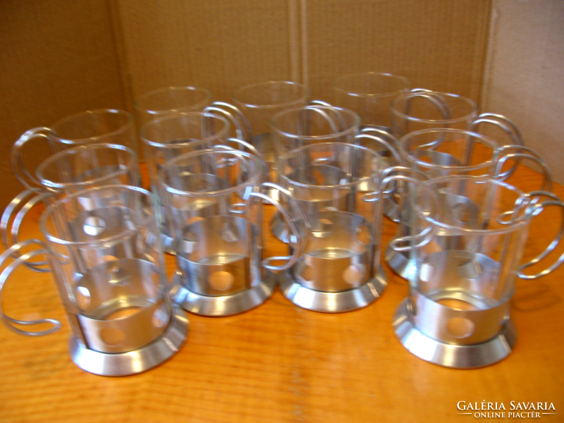 Retro heat-resistant glass glasses in stainless steel dotted holders for tea, mulled wine, coffee