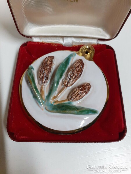 Old handmade pendant with hand-painted gilded rim in a velvet case