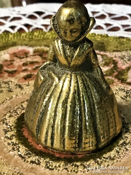 Antique brass maid bell, lady with basket sculpture, beautifully crafted