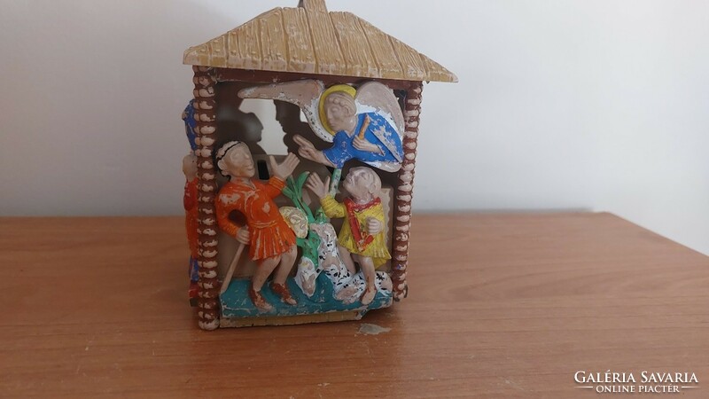 (K) musical Nativity scene made of wood with a clock structure