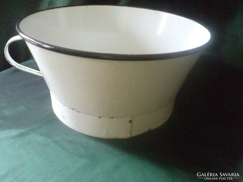 Old, white, two-ear, enameled filter or fruit washer