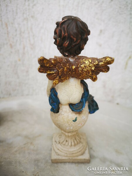 Winged painted colorful angels with angels, singly or in pairs