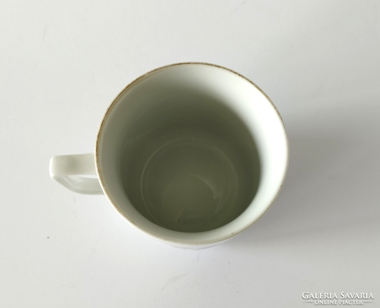 Beautiful old lowland porcelain mug with a flower pattern