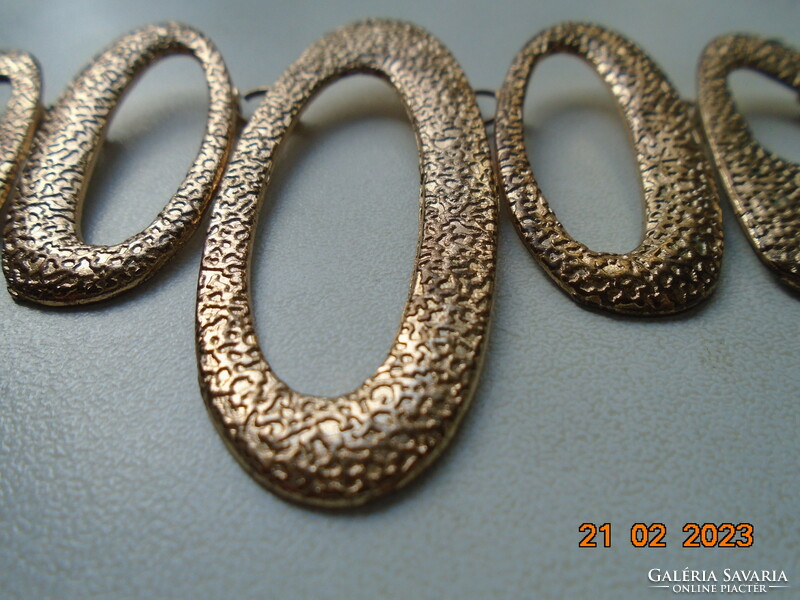 Handmade vintage necklace of 9 asymmetric oval textured elements with gold effect