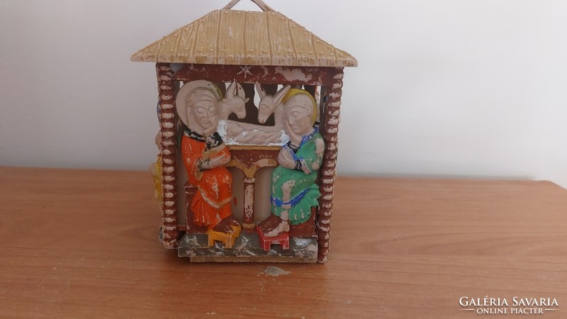 (K) musical Nativity scene made of wood with a clock structure