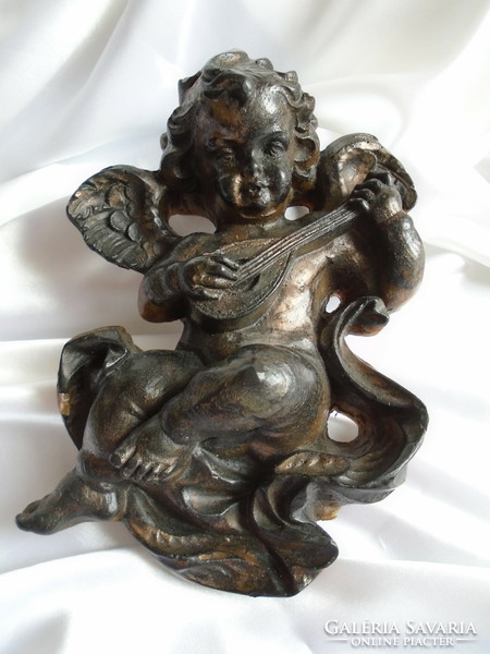 Dark negro brown-bronze large wax angel face.