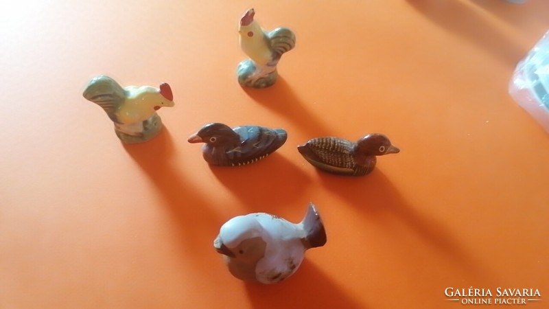 Porcelain animal figures for a doll house. 55.