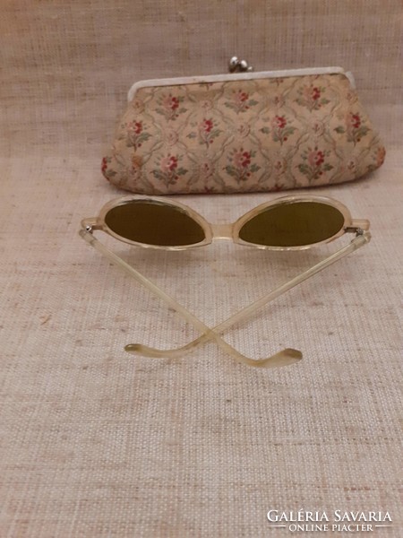 Retro sunglasses with glass lenses in a patterned frame in an embroidered patent holder