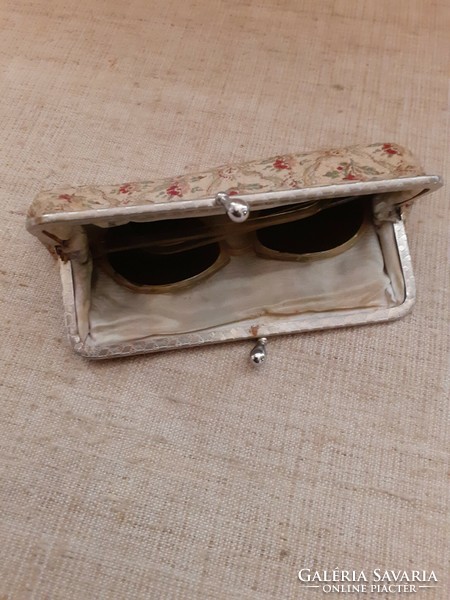 Retro sunglasses with glass lenses in a patterned frame in an embroidered patent holder