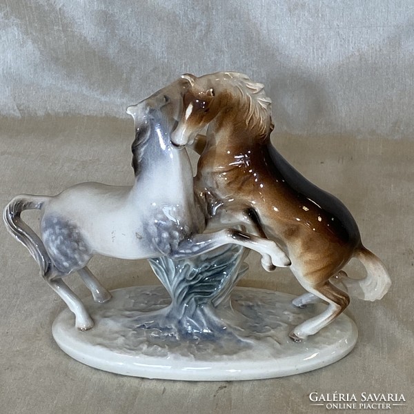 Antique porcelain playing horses
