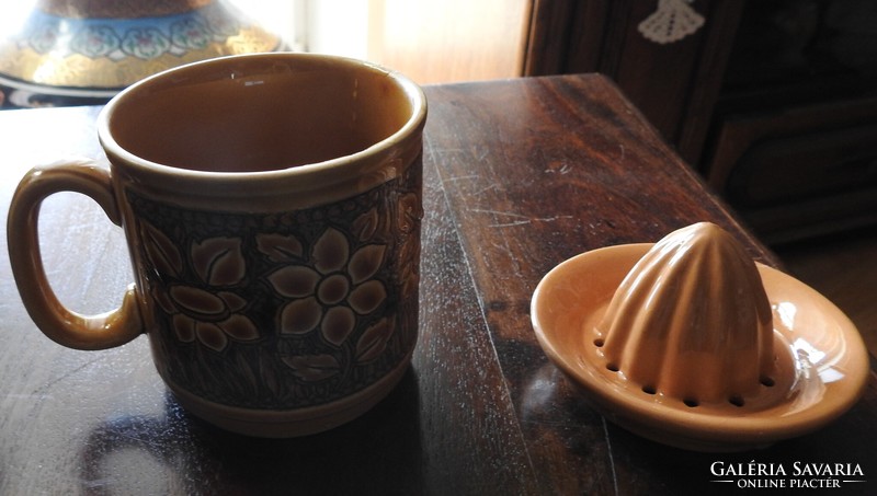 English glazed mug with lemon squeezer