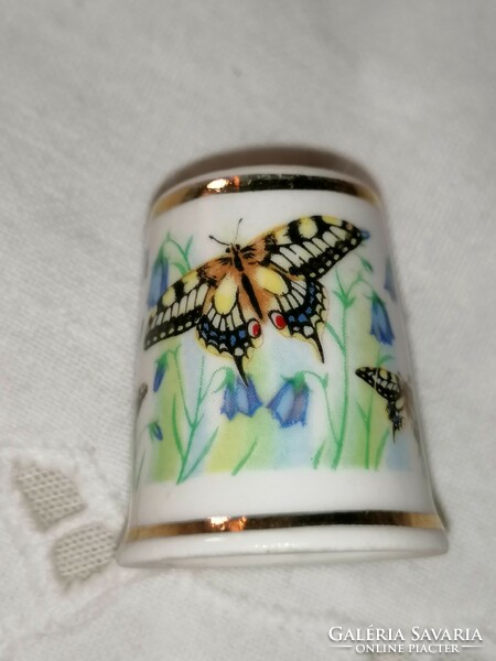 Very nice English butterfly thimble. 21.