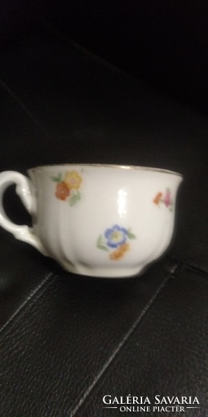 Thick antique cup with scattered flowers