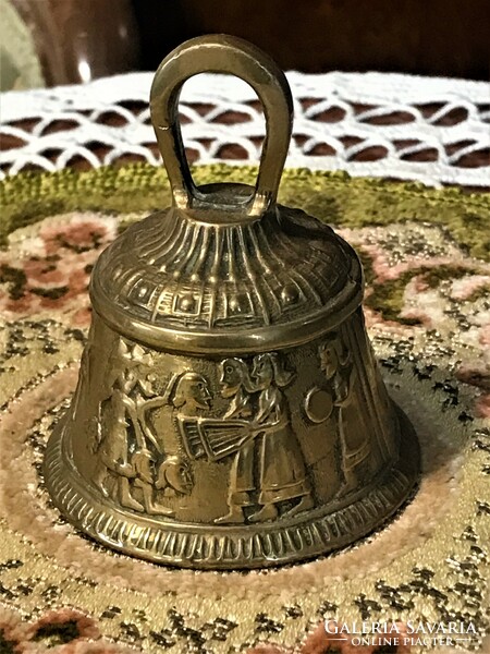 Antique brass servant bell, soldiers returning from battle, beautifully crafted