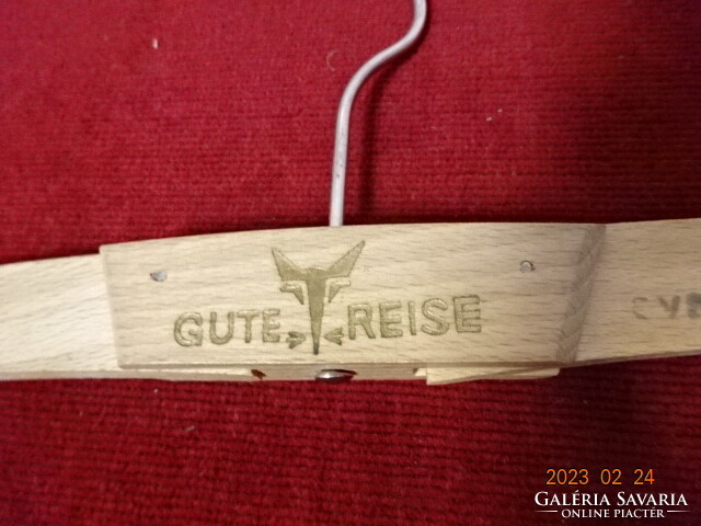 Folding, traveling wooden hanger, length 43 cm. Inscribed Gute reise. Jokai.