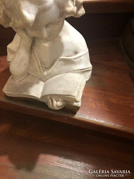 Terracotta statue of a little girl reading, classicist, signed, 32 cm high