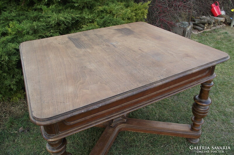 Antique robustly built dining table.