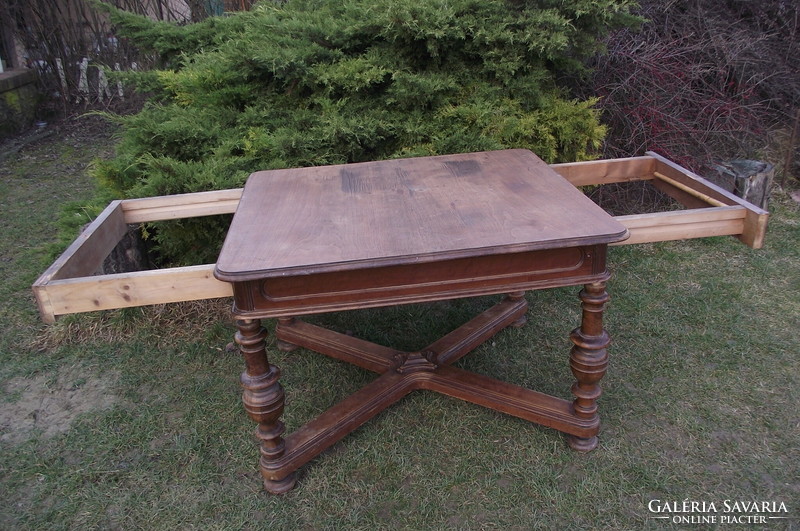 Antique robustly built dining table.